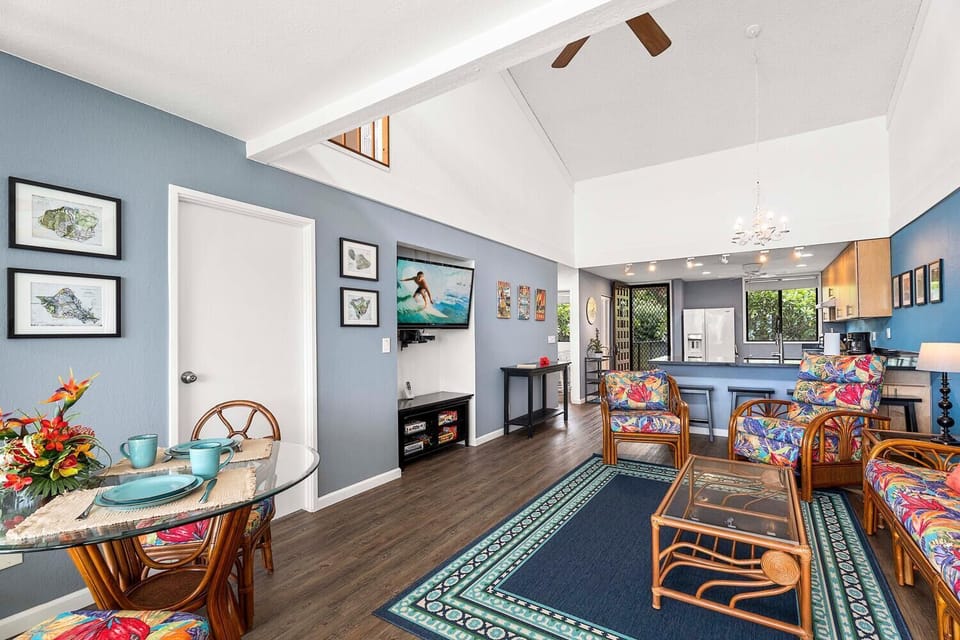 Open living area, primary bedroom is behind the door on the left