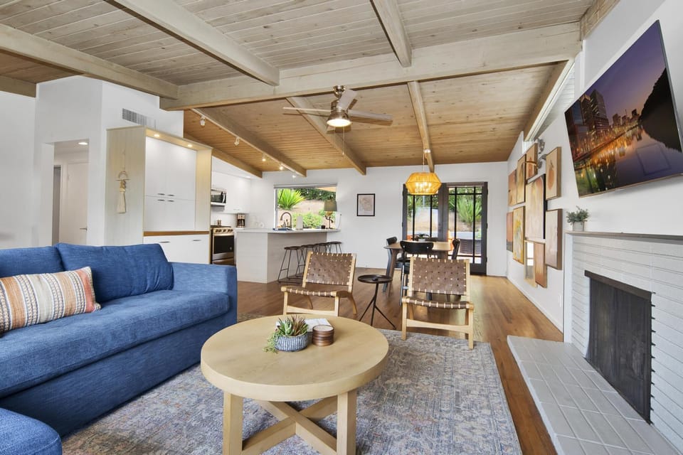 Living room: queen sofa bed, Smart TV. The fireplace is not operable.