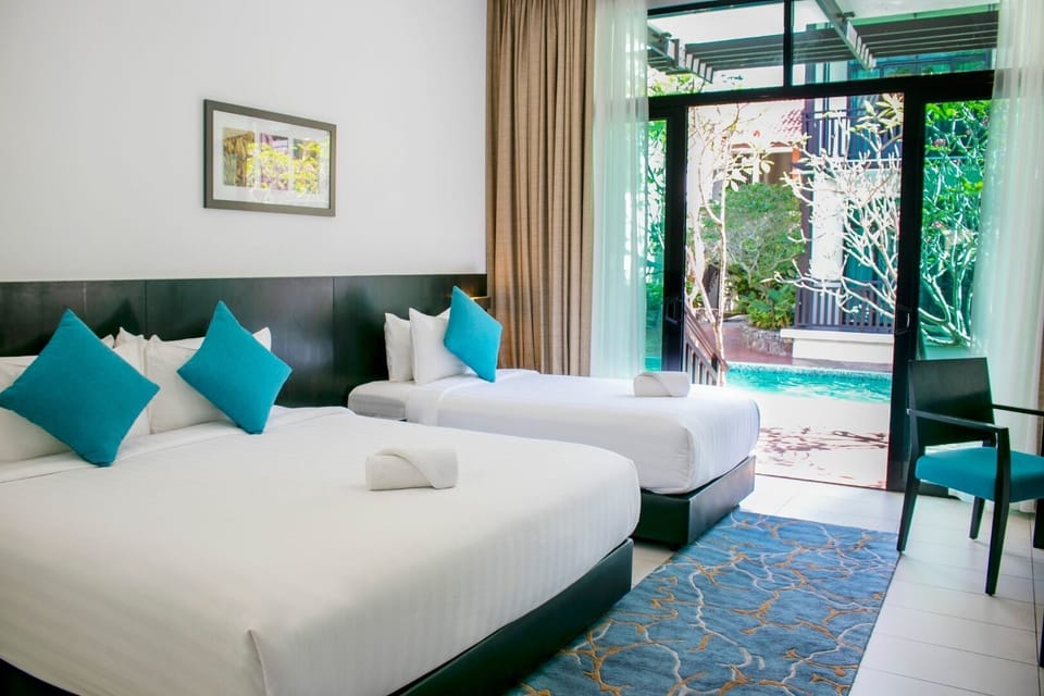 Premier Room, Multiple Beds | Minibar, in-room safe, desk, blackout drapes