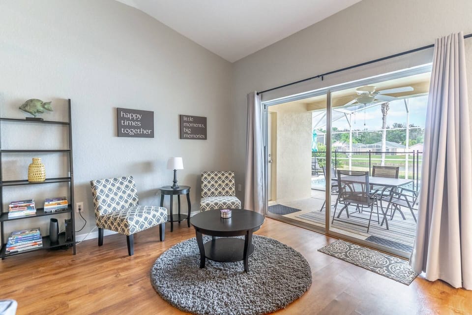 Sitting area perfect for morning coffee overlooking the pool