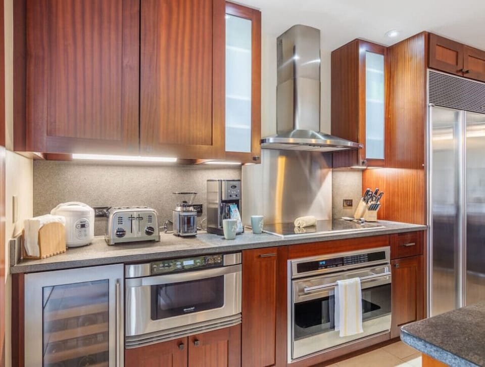 Fully equipped kitchen with stainless steel appliances