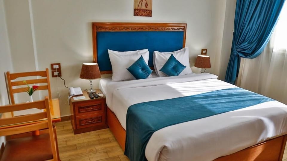 Standard Double or Twin Room | Minibar, in-room safe, free WiFi, bed sheets