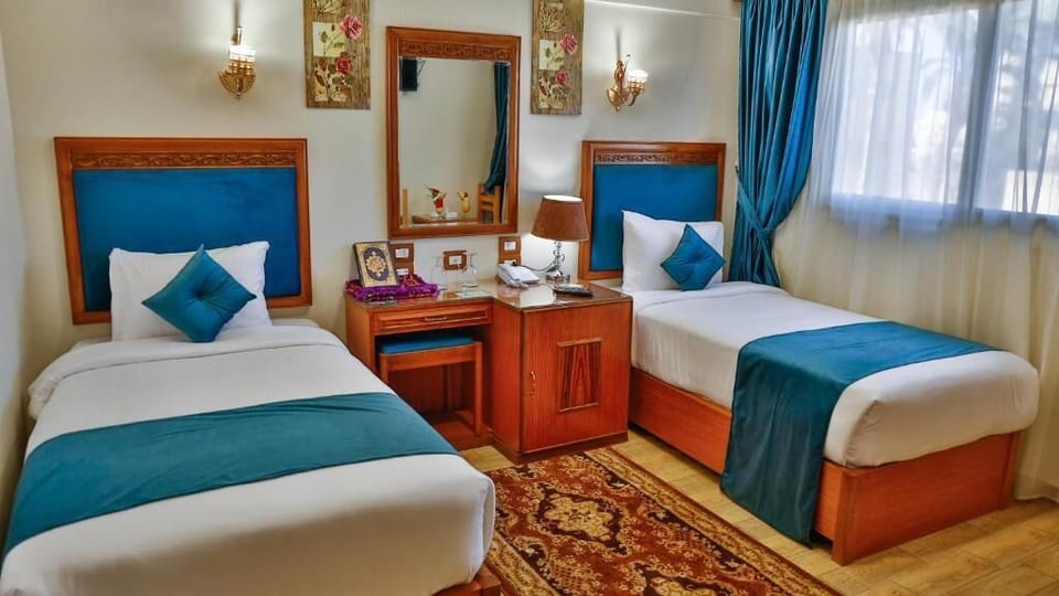 Standard Double or Twin Room | Minibar, in-room safe, free WiFi, bed sheets