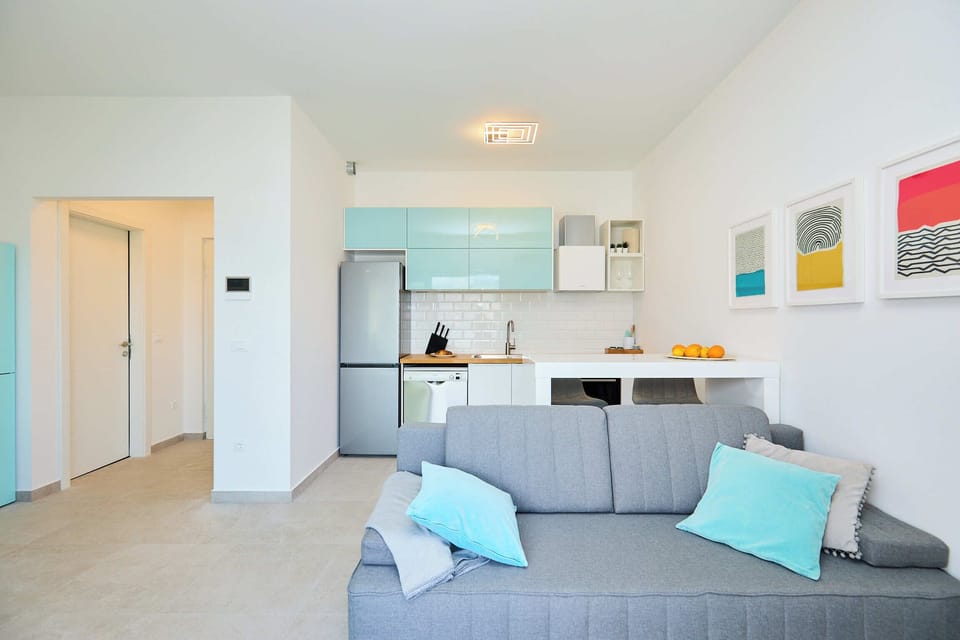 Apartment (1 Bedroom) | Living area | 120-cm Smart TV with cable channels