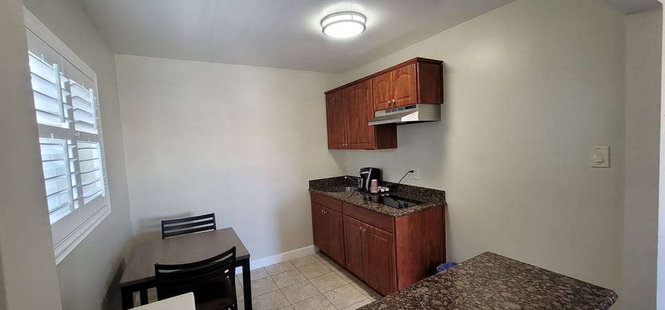 Exclusive Room, 2 Queen Beds | Private kitchen | Fridge, microwave