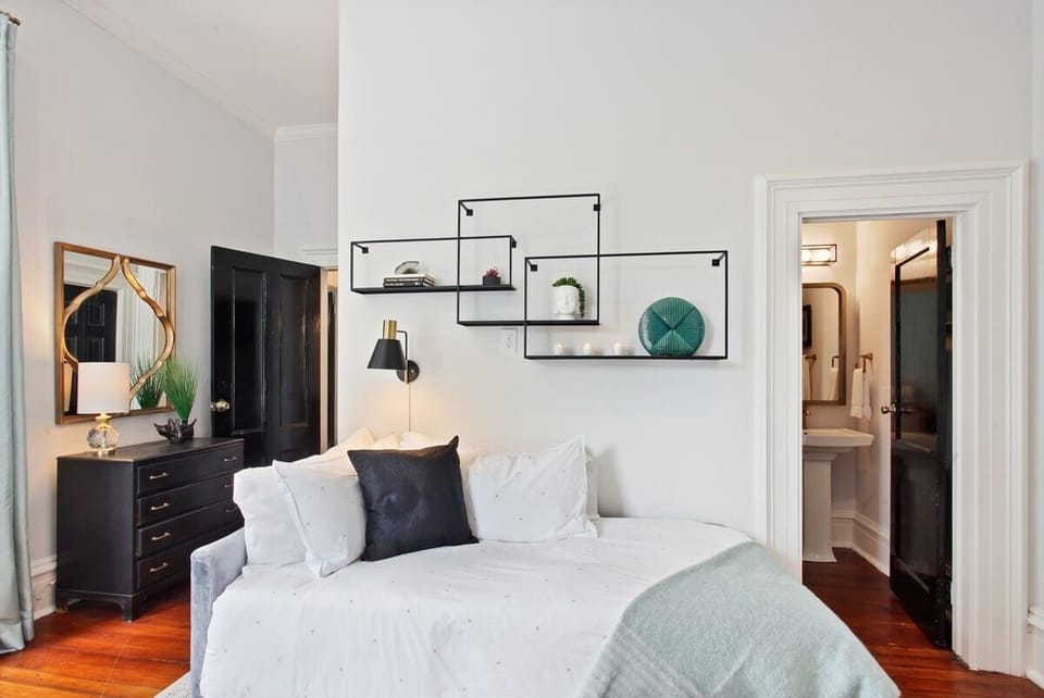 Bedroom 3 | Two Double Beds and Single Bed with Ensuite Bathroom and Natural Light | First Floor of Building — Unit on One Level