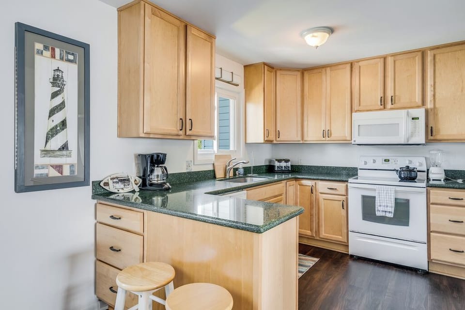 Well-Stocked Kitchen with all you need to make mealtime a bay breeze.