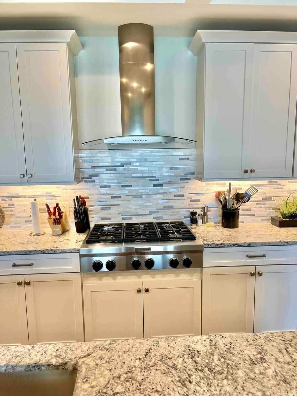 Elegant kitchen with premium finishes and lighting