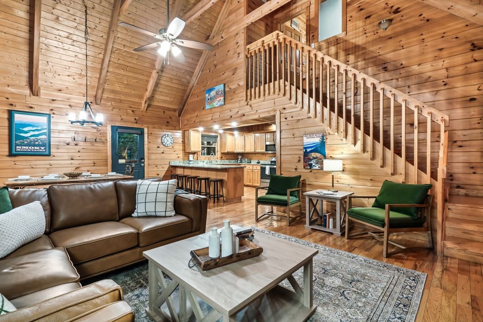 View of main floor living area leading to the upstairs master bedroom