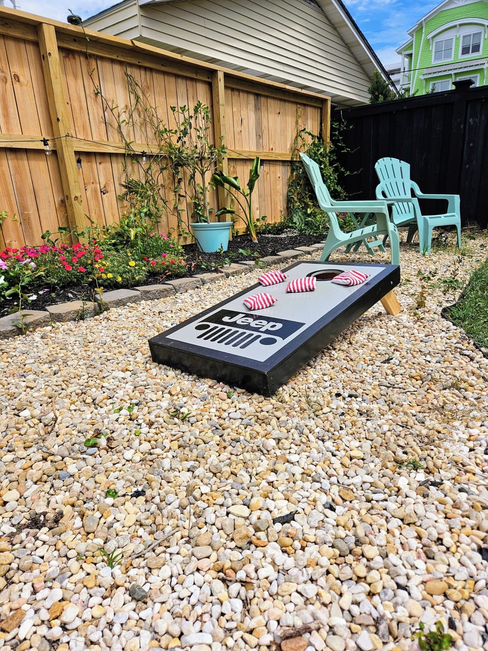 Seating for 8 outside and cornhole boards