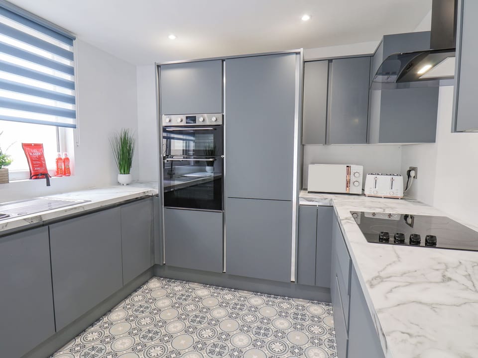 Fridge, electric kettle, toaster, cookware/dishes/utensils