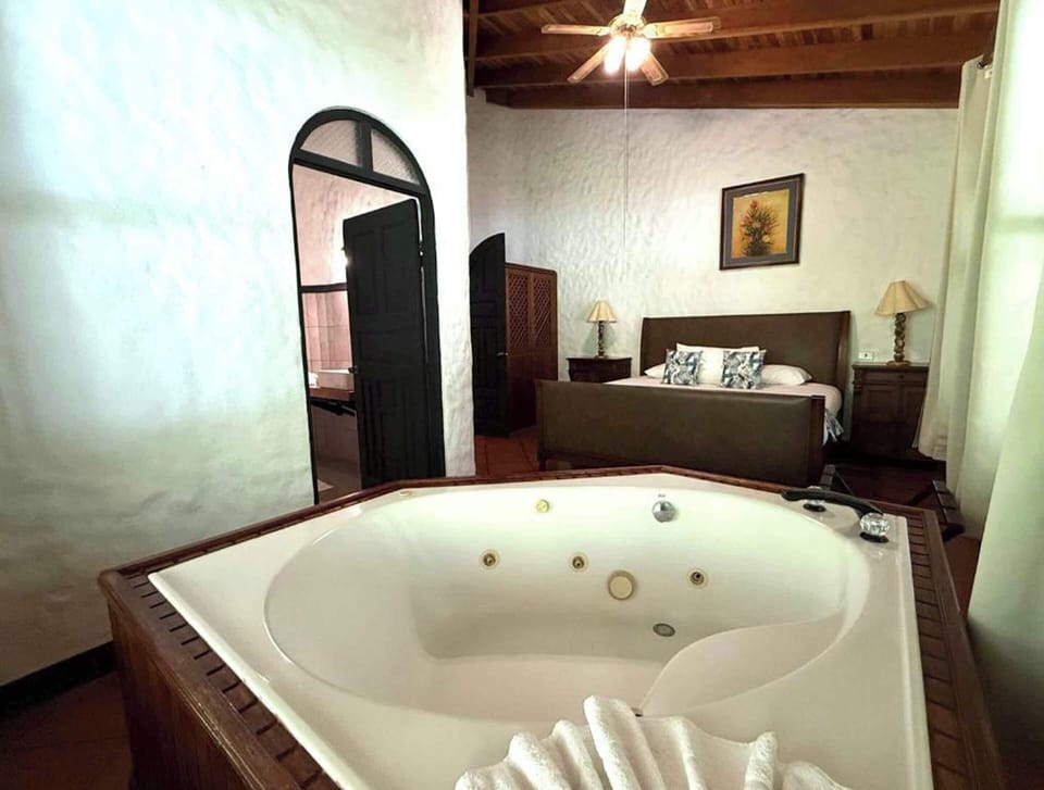 Two-Bedroom Villa | Bathroom | Rainfall showerhead, free toiletries, hair dryer, towels