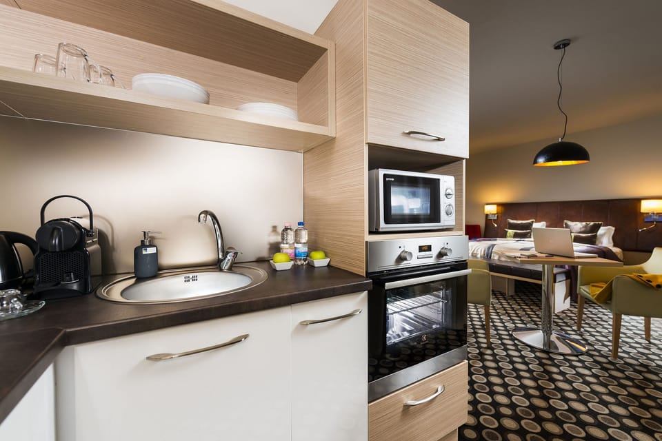 Luxury Suite with Sauna | Private kitchenette | Coffee/tea maker, eco-friendly cleaning products