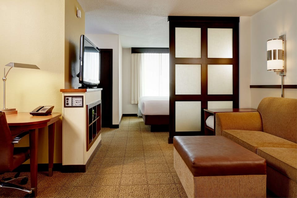 Blackout drapes, iron/ironing board, cribs (free), WiFi (free)