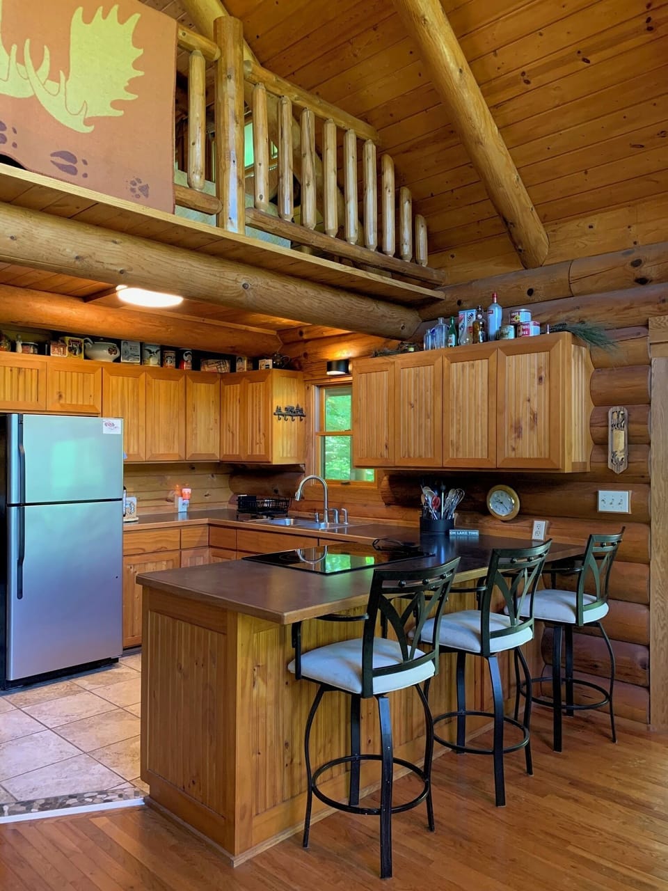 Kitchen island with seating for three. Table seats 6. 