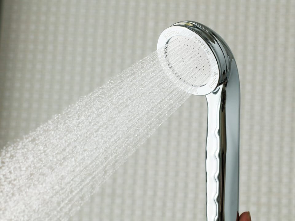 Combined shower/tub, free toiletries, hair dryer, slippers