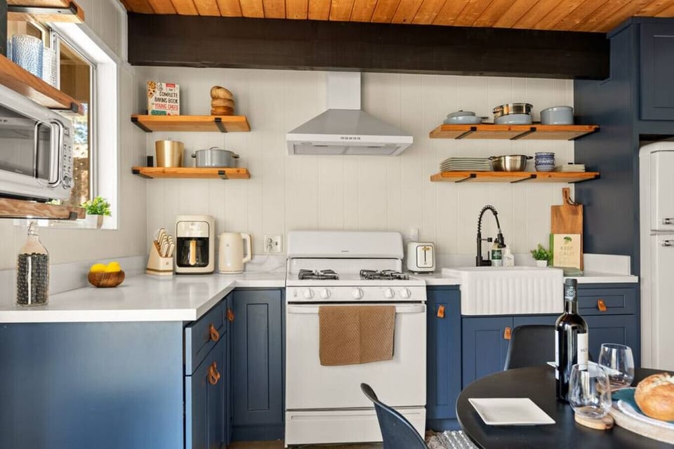 Fully stocked kitchen has everything you need to make a memorable meal during your stay.