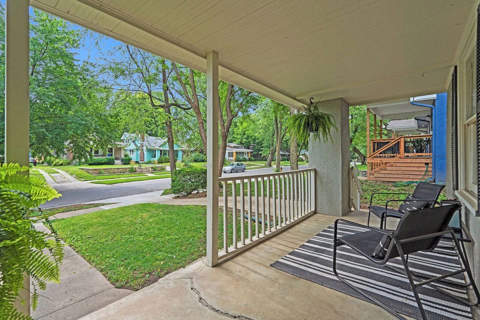 Inviting wraparound-style porch overlooking quiet, tree-lined streets—perfect for morning coffee or relaxing after a day exploring Brookside and nearby shops.