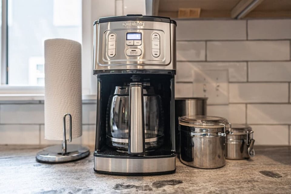 A drip coffee maker and essentials