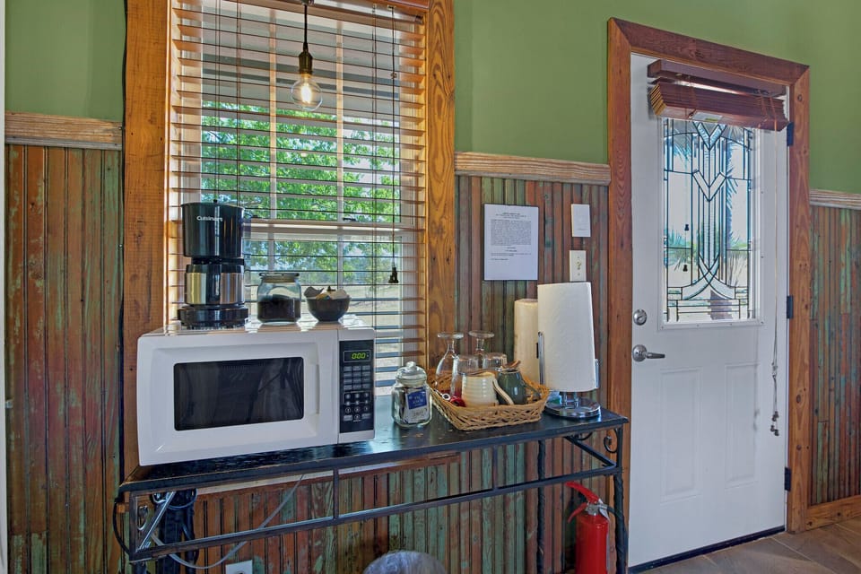 Close up of the coffee bar with microwave.