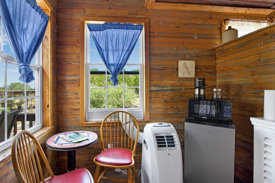 The entry way to the suite.  This shows the small dining area and coffee bar.  The cabin also has a small refrigerator and microwave.