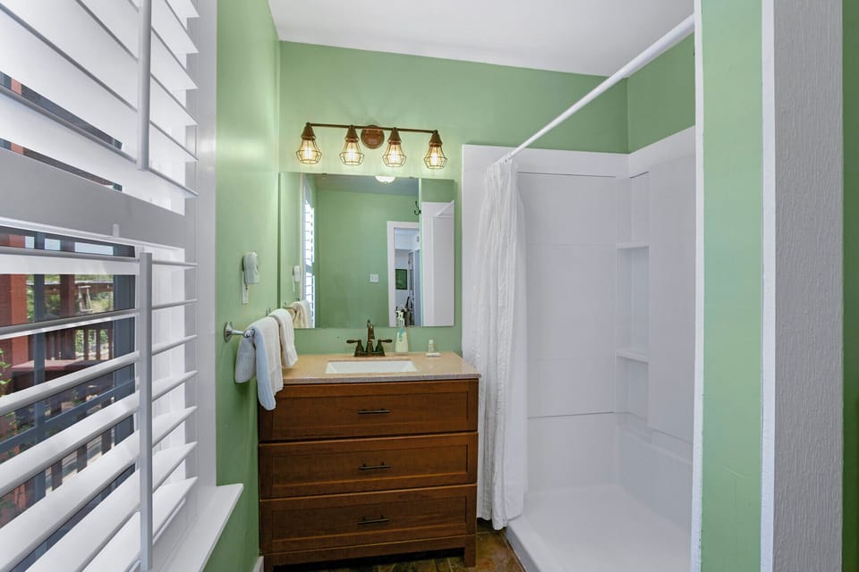 Suite Thyme has an attached bathroom with walkin shower.