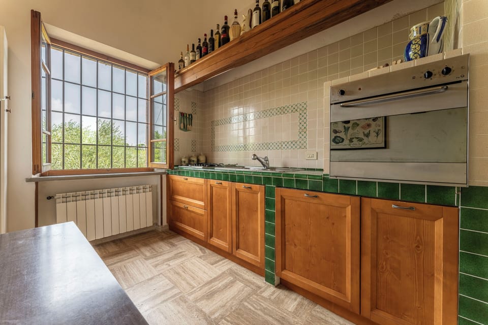 Villa | Private kitchen | Full-size fridge, microwave, oven, stovetop