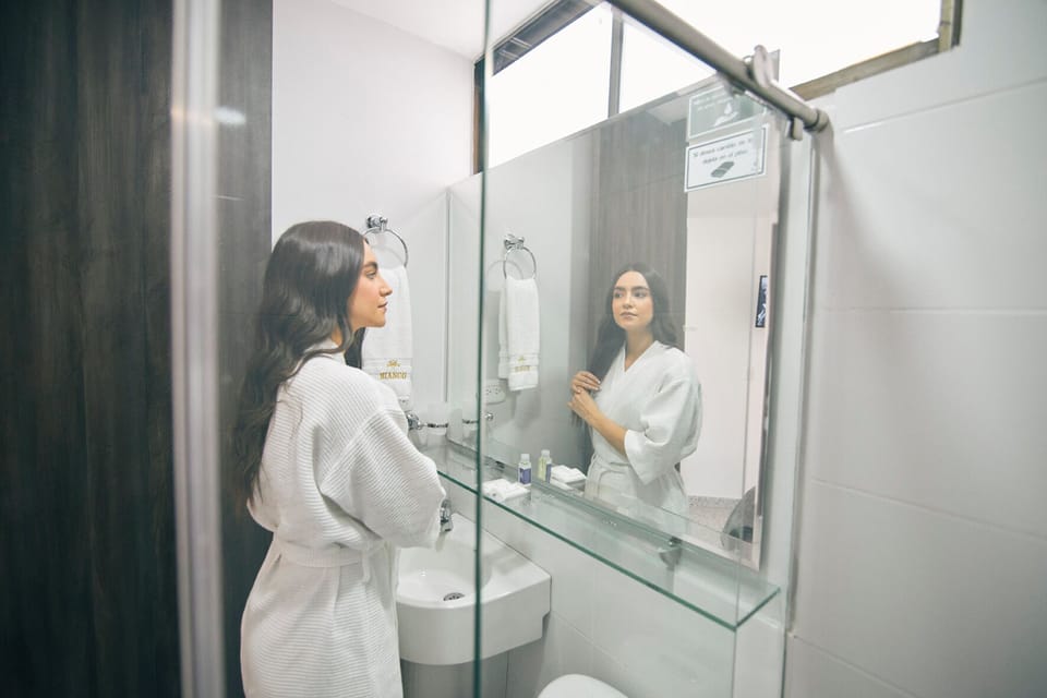 Basic Single Room | Bathroom | Shower, towels, soap, shampoo