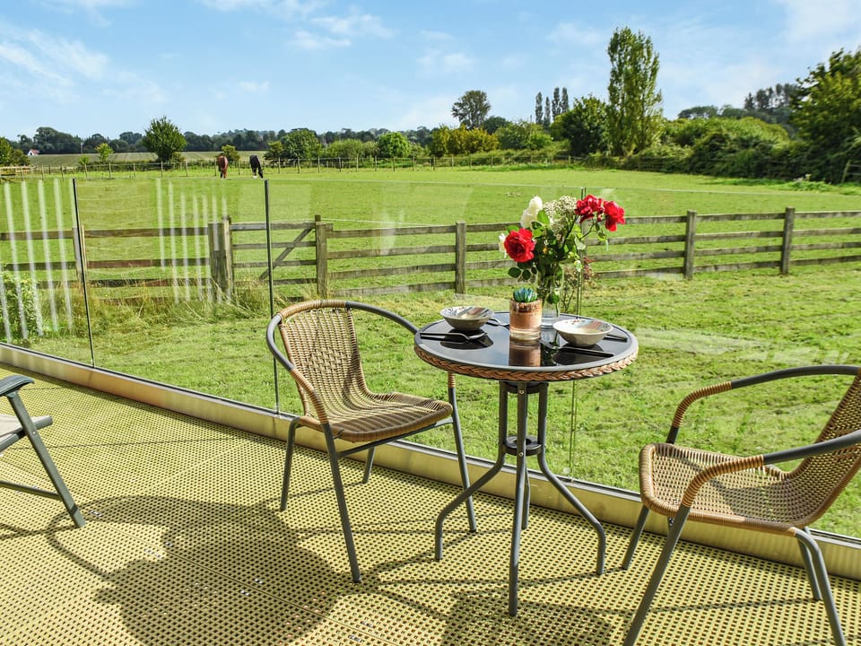 Terrace | Cedar Lodge - Solar Rise Lodges, Old Buckenham
