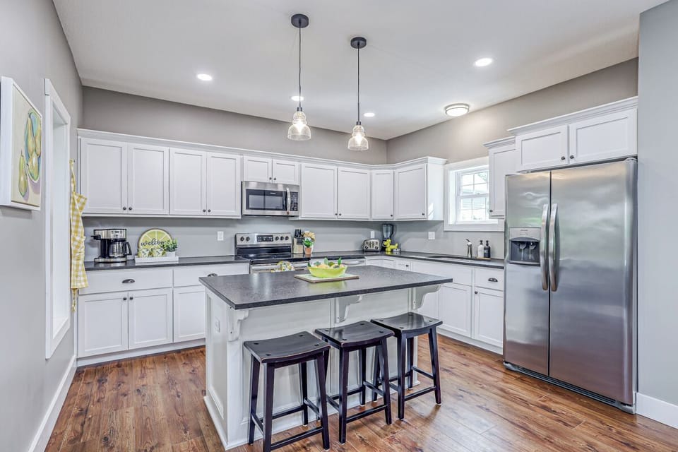 Light and bright kitchen with island.