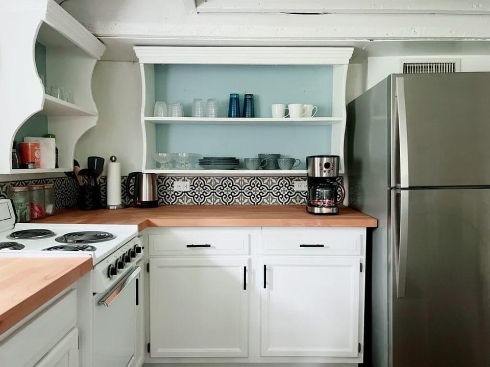 Kitchen is Fully Stocked with Dishes 