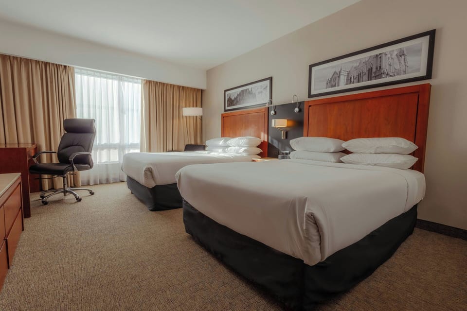 Deluxe Room, 2 Double Beds, Pool View | Premium bedding, in-room safe, desk, blackout drapes