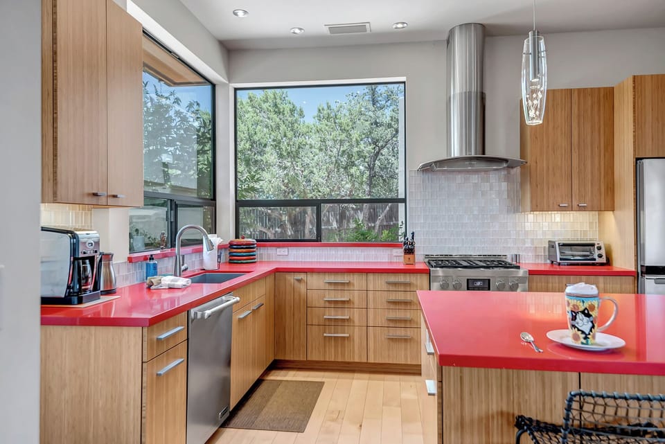 Large windows provide views of the stunning surroundings