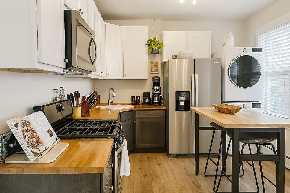 Stocked kitchen with cookware, essentials, and space to prepare meals or enjoy a relaxed breakfast.