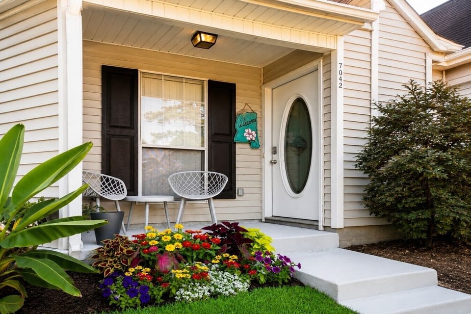 A warm welcome awaits at your private front porch.
