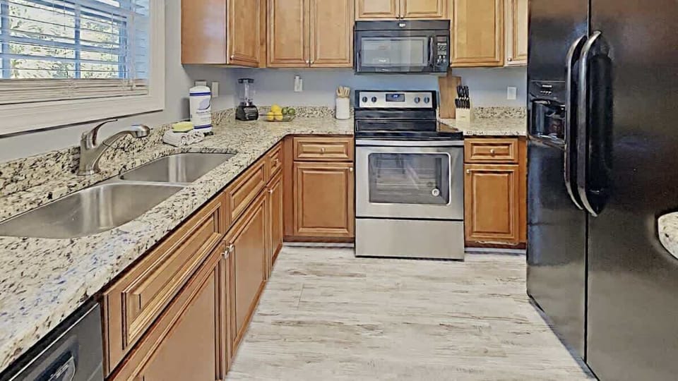 Fully stocked kitchen with everything you need for home-cooked meals by the beach.

