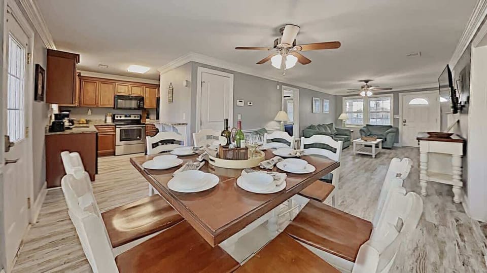 Share meals, laughter, and stories in this cozy dining nook by the beach.

