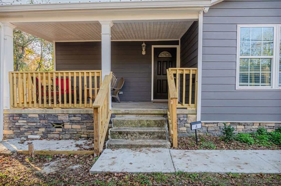 Relax and unwind on the spacious front porch of this charming home. Enjoy the fresh air and peaceful surroundings while taking in the beautiful views.