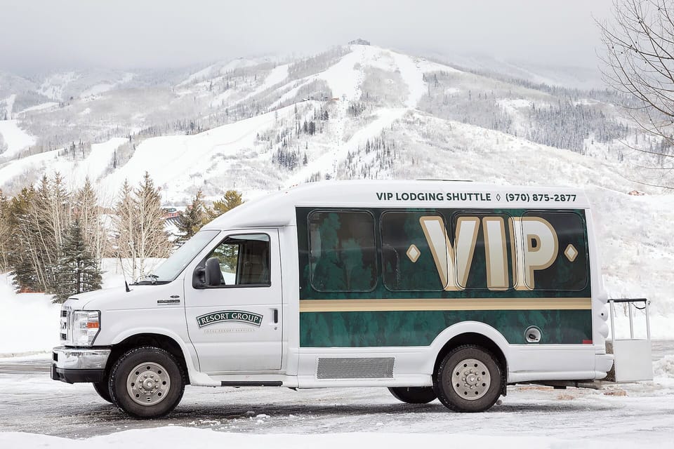 VIP shuttle service provides convenient transportation to nearby ski slopes, with snow-covered mountains creating a perfect winter backdrop for your mountain getaway.
