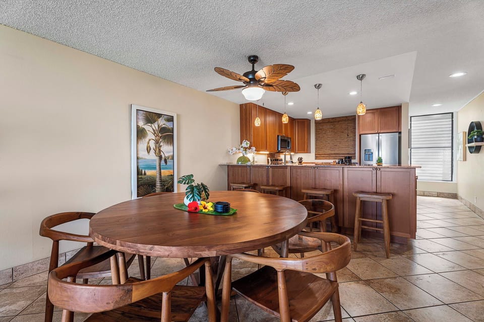 Dining table with five seats, perfect for small families.