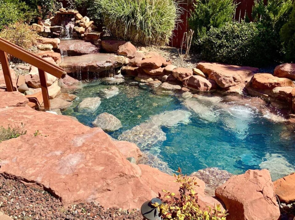 Outdoor soaking pool in the backyard.