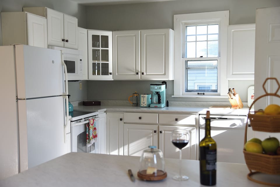 Fully equipped, roomy kitchen that opens to the dining room. 