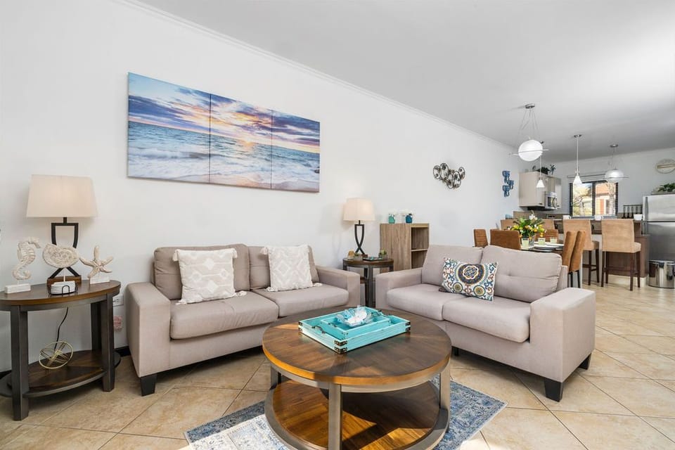 An open concept living dining room. Perfect  for more social interaction among family members and friends!
