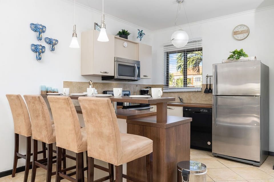 Start the day with coffee or end the night with tall drinks in this comfy and sleek bar stools.