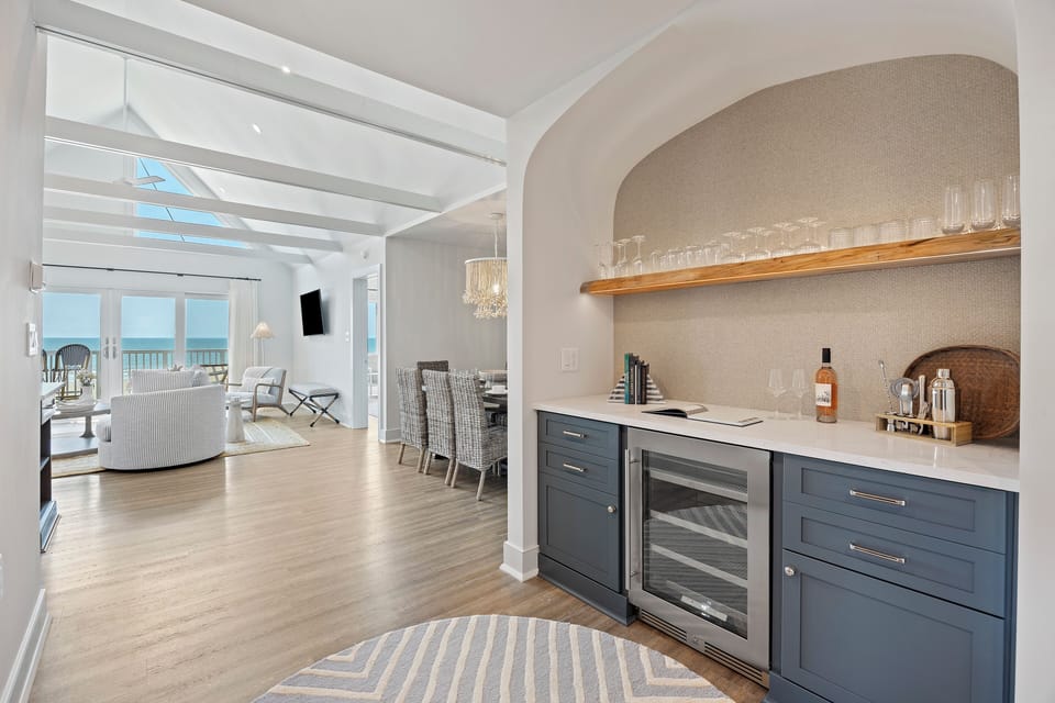 Let's walk through the condo.. foyer with wet bar.