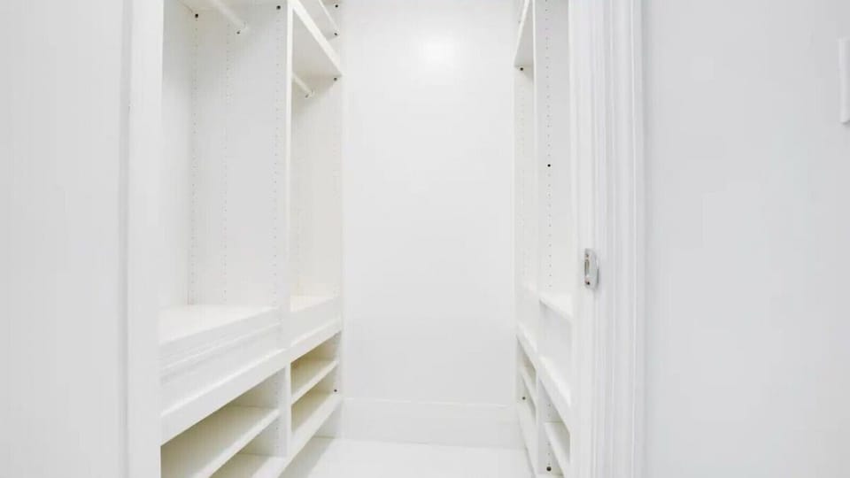 A generously-sized and neatly organized closet