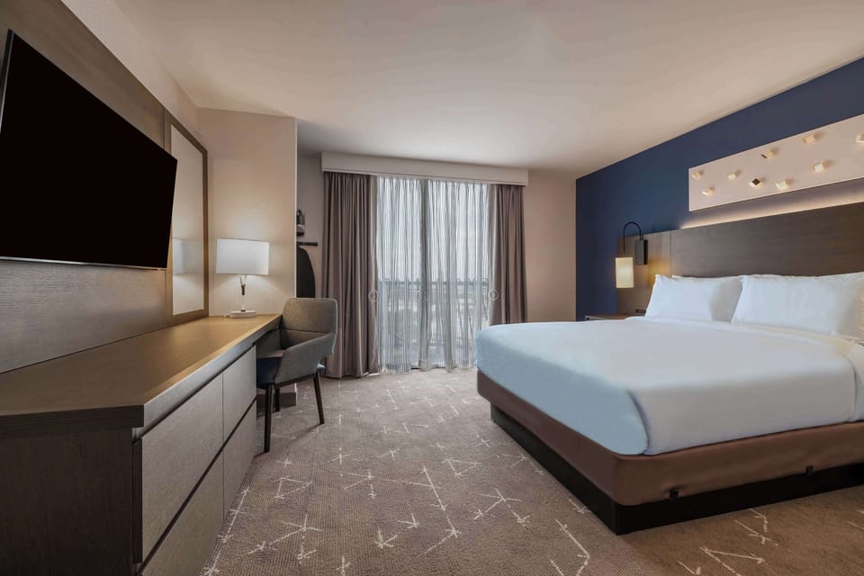 Suite, 1 King Bed, Accessible, Bathtub | Premium bedding, in-room safe, desk, blackout drapes