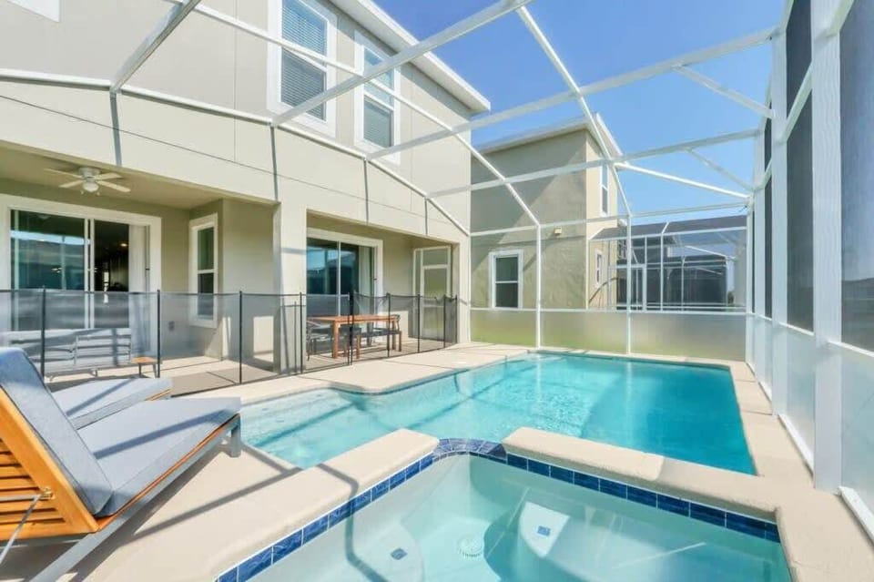 Relax by your private pool with comfortable outdoor seating, perfect for soaking up the Florida sunshine. Optional pool heat is available for an additional fee during cooler months.
