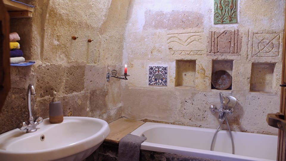 Triple Room with Bathtub  | Bathroom | Shower, hair dryer, towels, soap