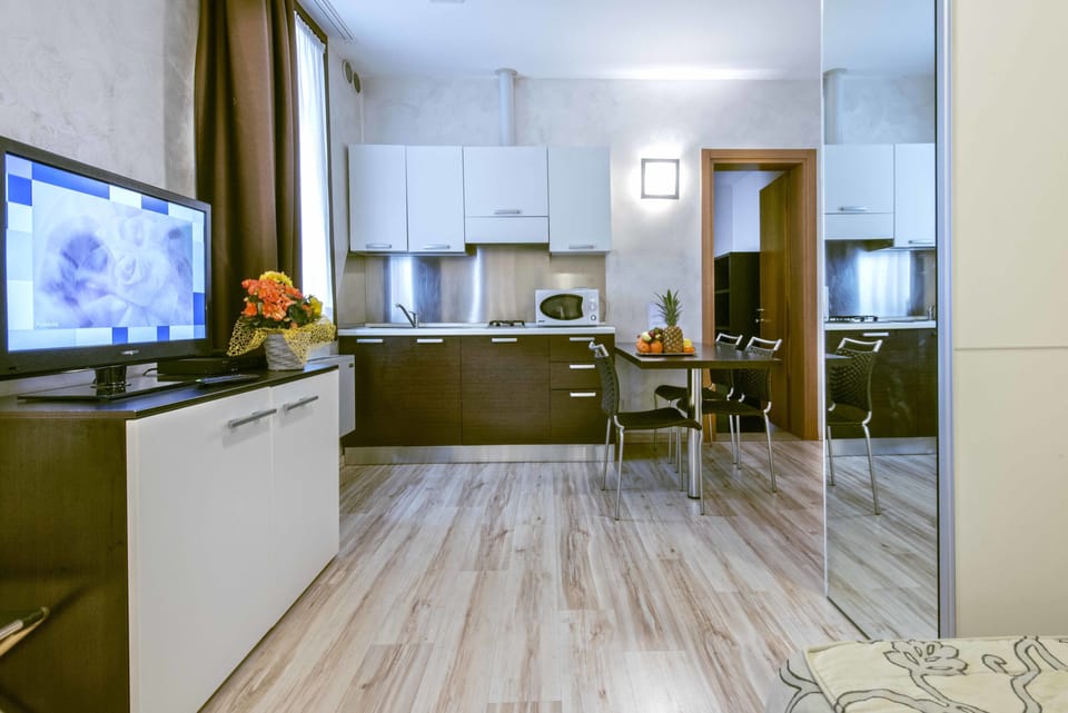 Apartment, 1 Bedroom | In-room safe, iron/ironing board, free WiFi, bed sheets